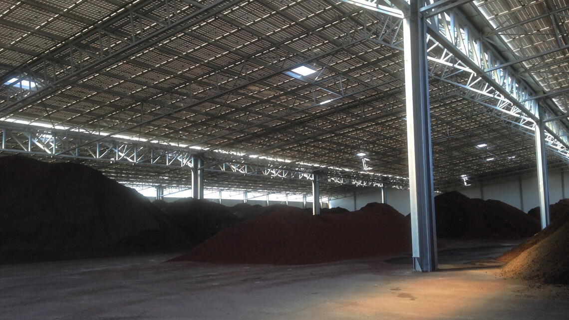 Peat shown under covered galvanized steel structure to protect it from the Mistral